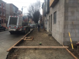 Concrete sidewalk removed and dirt prepped, along with forms being built - Philadelphia