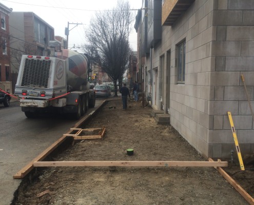 sidewalk after concrete removal and ground prep Concrete sidewalk removed and dirt prepped, along with forms being built - Philadelphia